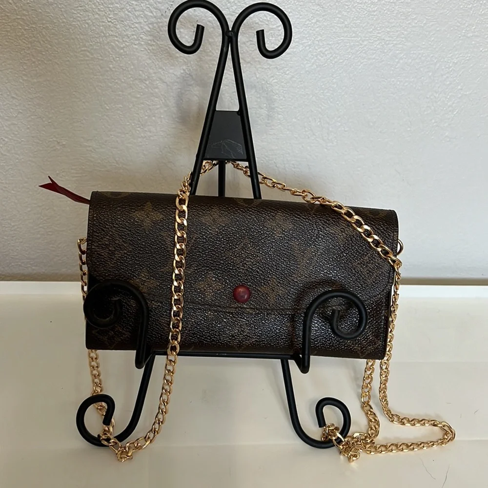 Louis Vuitton Brown Monogram Crossbody with Red Accent